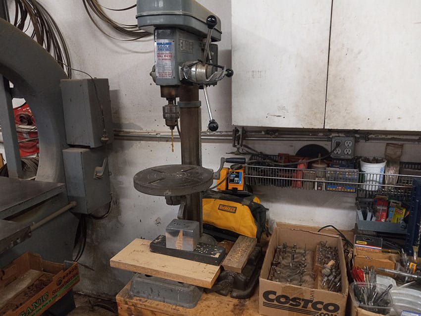 Variable speed drill press with adjustable table for accurately drilling holes of various sizes for various size screws and counter sinking. Various drill bits and router bits.