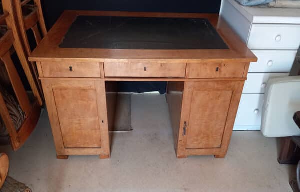 20th Century Biedermeier Writing Kneehole Desk 
For Sale 20th century birch wood writing table with kneehole has charm and grandeur. This collection piece is in good and restorable condition and was built to last. For More Information, click here.